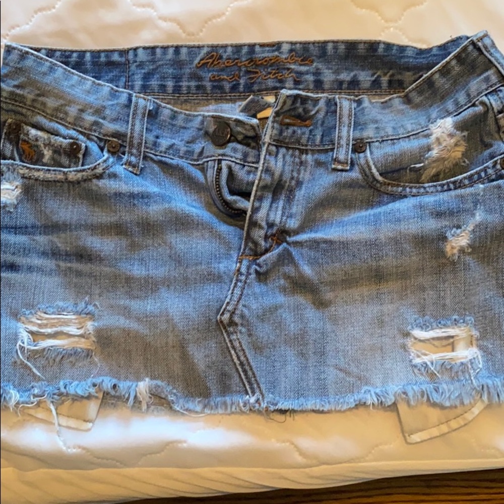 Short blue jeans skirt